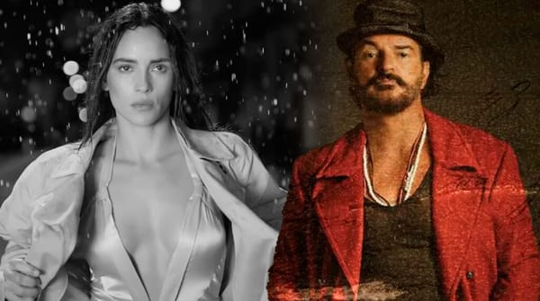 Mujer bajo lluvia y hombre con sombrero rojo