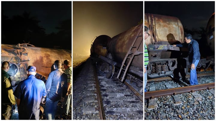 Inspección de tren descarrilado en la noche