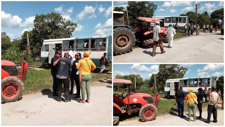 Intersección con bus y tractor, personas reunidas afuera.