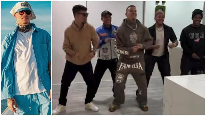 Hombre sonriente y grupo bailando alegremente