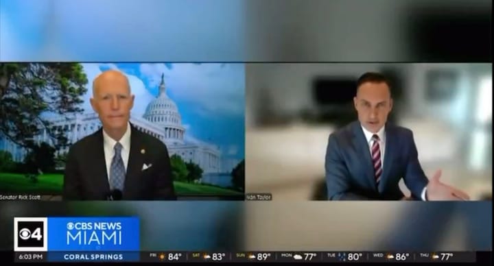 Captura de TV, dos hombres hablando desde estudios diferentes