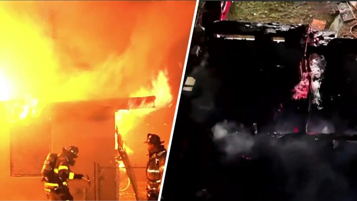 Bomberos combaten incendio en edificio en llamas.